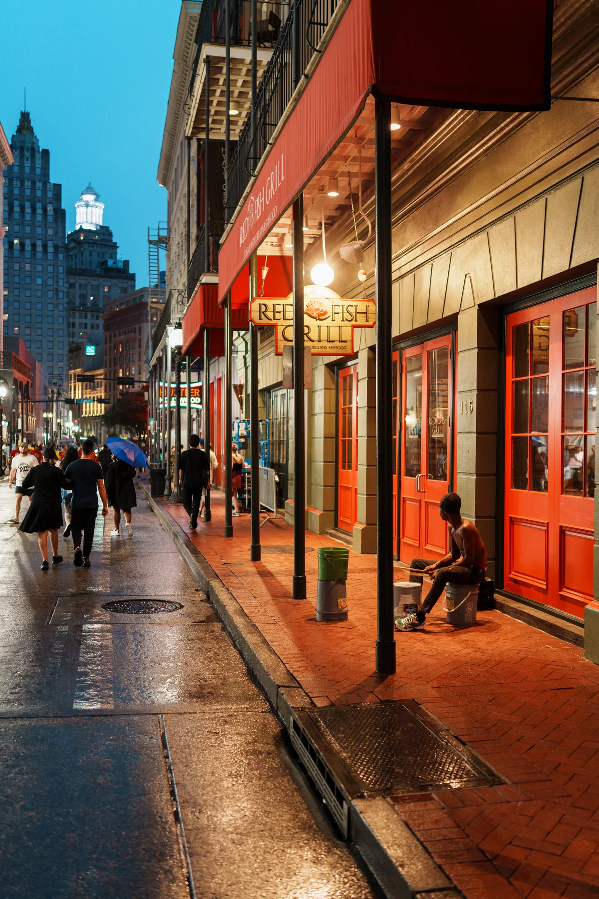 Red Fish, Wet Street — fine art print by Tosh Persons
